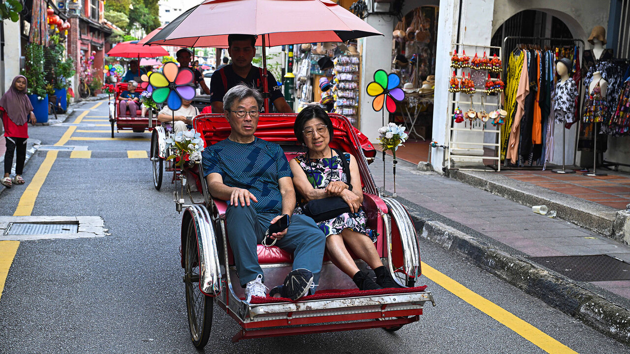 Le vélo-taxi fait toujours partie du paysage de George Town